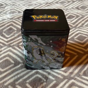 Pokemon Black Tin with White and Yellow Arcanine Artwork